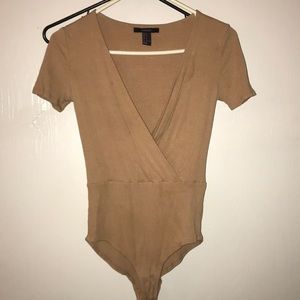 Tan one piece , perfect condition
